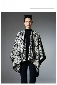Detail of a women's mink textured shawl featuring a black and white ink art print