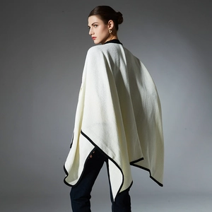Elegant white knitted shawl wrap with black trim and textured fabric for women