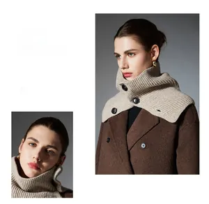 Detail of beige ribbed knit buttoned neck warmer styled with a brown wool coat