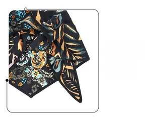 Detailed view of bohemian paisley pattern print and exquisite hemmed edges on the scarf