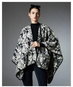 Detail of the elegant black and white abstract ink art pattern on this luxury shawl wrap
