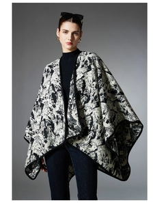 Detail of high-density knit shawl featuring black and white ink wash art pattern