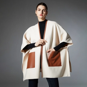 Elegant cream beige wool shawl cape with brown leather pockets and piping for autumn winter