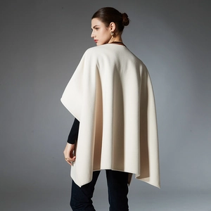 Elegant cream white knitted shawl wrap with premium leather pocket detail and draped design