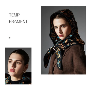 Detail of vintage paisley pattern on thick knitted balaclava hooded scarf for women