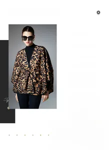 Detail of leopard print shawl featuring waist belt closure and elegant black piping edge