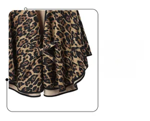 Detail of leopard print shawl featuring precise black trim and a decorative tie knot
