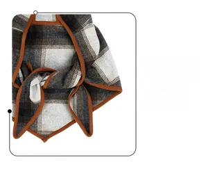 Detail of checkered wool balaclava scarf featuring premium dark brown edge binding finish