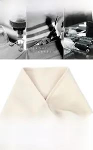 Exquisite craft detail of solid cream triangle scarf with premium edge stitching texture