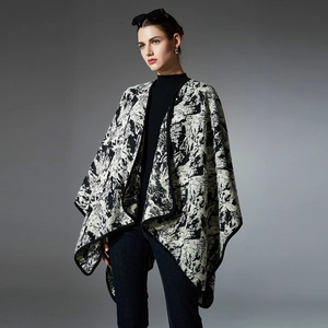 Women's mink-style long poncho jacket featuring an abstract black and white ink painting
