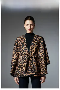 Detail of a leopard print shawl for women featuring a matching waist belt and thick fabric
