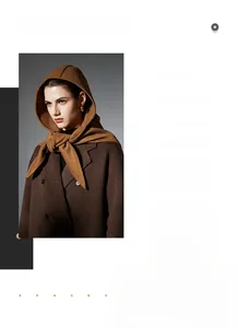 Detail of a brown hooded wool scarf wrap styled with a caramel double-breasted coat