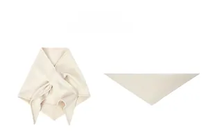 Detailed view of cream-colored knit triangle scarf with flat stitched edge finishes