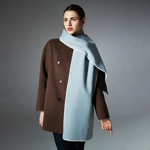 Solid brown wool coat with a light blue scarf featuring white decorative zigzag stitching