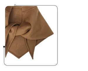 Detail view of brown wool balaclava featuring precision edge stitching and geometric pointed design