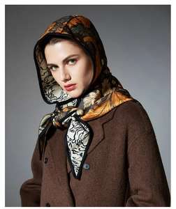 Detail of floral printed balaclava scarf paired with a brown double-breasted wool coat