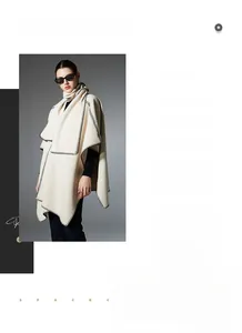 Macro view of cream textile shawl with black contrast stitching in minimalist Nordic style