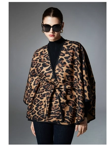 Detailed view of leopard print shawl featuring adjustable belt and thick fabric texture