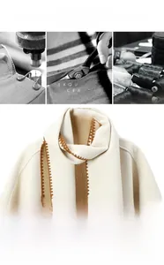 Exquisite craft detail of beige scarf with brown zigzag embroidery on soft fabric