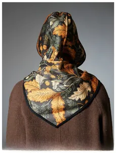 Detail view of winter balaclava hood with vintage oak leaf jacquard pattern and thick fabric