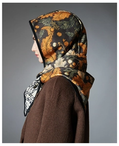 Detailed close-up of French vintage leaf pattern on an autumn balaclava hood shawl