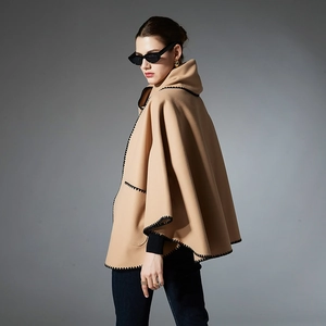 Classic camel wool poncho for women with black wave-edge stitch detail and open-front design