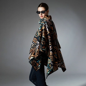 Deep blue paisley printed poncho for women with high collar and artistic autumn leaf patterns