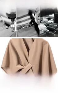 Detailed view of camel wrap shawl fabric texture and craftsmanship for autumn winter wrap