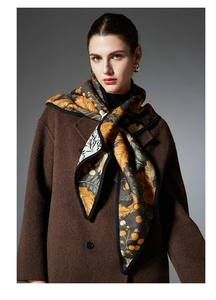 Detail of silk scarf with vintage floral pattern styled as a neck accessory