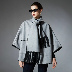 Grey wool-feel shawl cape with black embroidered zigzag edges and long tassels for winter