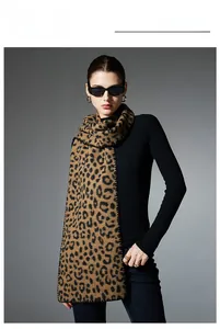 Detail shot of leopard print scarf featuring premium lock-stitch edges and soft knit texture