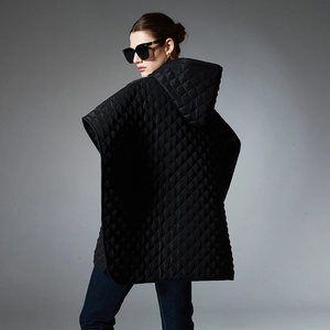 Women's black quilted hooded cloak with a minimalist diamond pattern and zipper