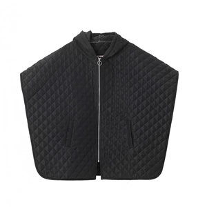 Women's black quilted hooded poncho cape with diamond patterns and front zipper closure