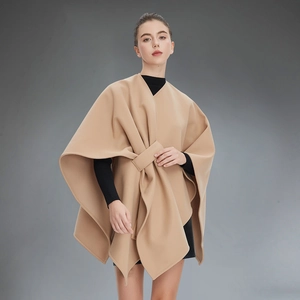Elegant khaki sleeveless poncho cape with waist buckle for a sophisticated autumn winter style