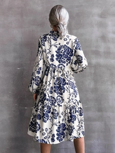 Elegant long sleeve midi dress with vintage blue floral print and tiered ruffle hemline