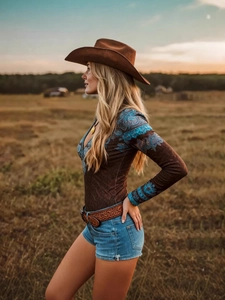 Women's vintage western long sleeve V-neck top with turquoise patterns and cowboy hat