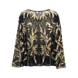 Elegant long sleeve sequin top with gold floral embroidery on black mesh fabric