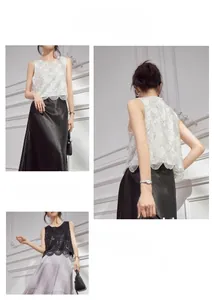 Detailed close-up of sleeveless sequin top with delicate wavy texture and beadwork details
