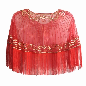 Close-up of red mesh shawl featuring golden sequins patterns and dense long tassel hem