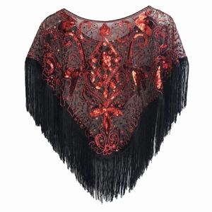 Detail of 1920s vintage black mesh shawl featuring red sequins and long fringe tassels