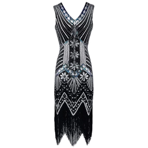 Close-up of 1920s vintage black dress with shimmering sequins and long fringe detail