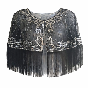Vintage 1920s mesh wrap cape with silver sequins, beads and long fringe on white background