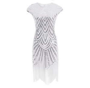 Detail of white 1920s Gatsby style dress featuring sequins and long fringe hem