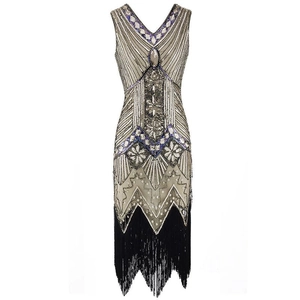 Detail view of 1920s vintage V-neck dress featuring sequins and black fringe hem