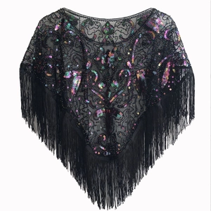 Detail of 1920s vintage shawl with colorful sequins, black mesh and fringe trim