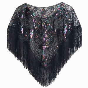Detail of vintage black lace shawl with iridescent sequins and fringe for party