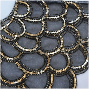 Vintage 1920s evening shawl with gold sequins and beads in a retro fish scale pattern