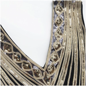Vintage 1920s V-neck party dress with gold sequin embroidery and fringe details