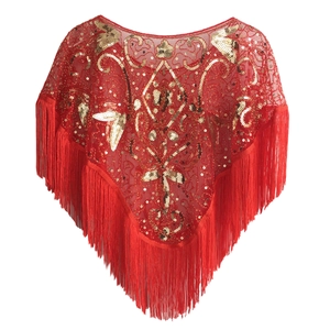 Detail of red mesh shawl with gold sequins and long fringe in 1920s vintage style