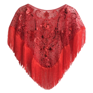 Detailed macro view of red sequin embroidery and long tassels on mesh cape shawl